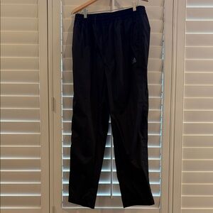 Adidas Men's Black golf rain pants.